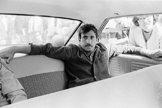 Jack Weinberg in the police car. Photo by Steve Marcus, from the New York Times, Oct. 1, 2014.